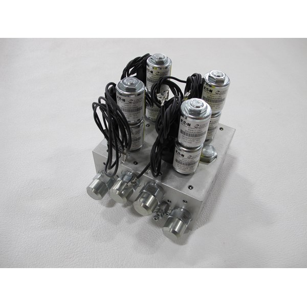 MANIFOLD INCLUDING COILS